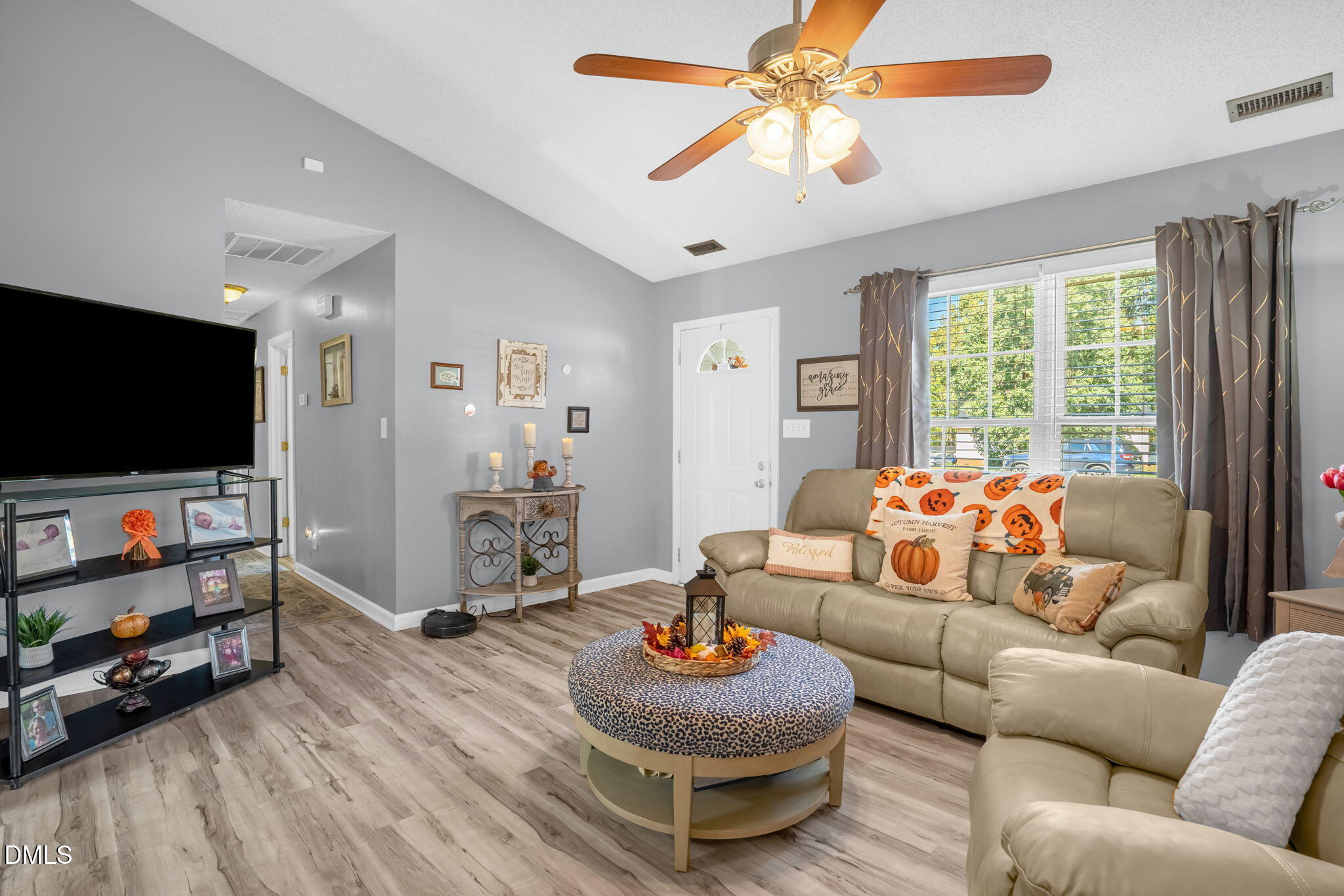 5626 Preston Loop Mebane, NC 27302 - Photo 9 of 33 a living room with furniture and a flat screen tv