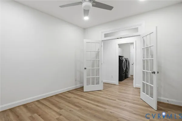 a utility room with sink dryer and washer