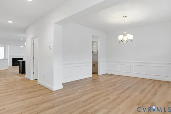 a view of a livingroom with wooden floor