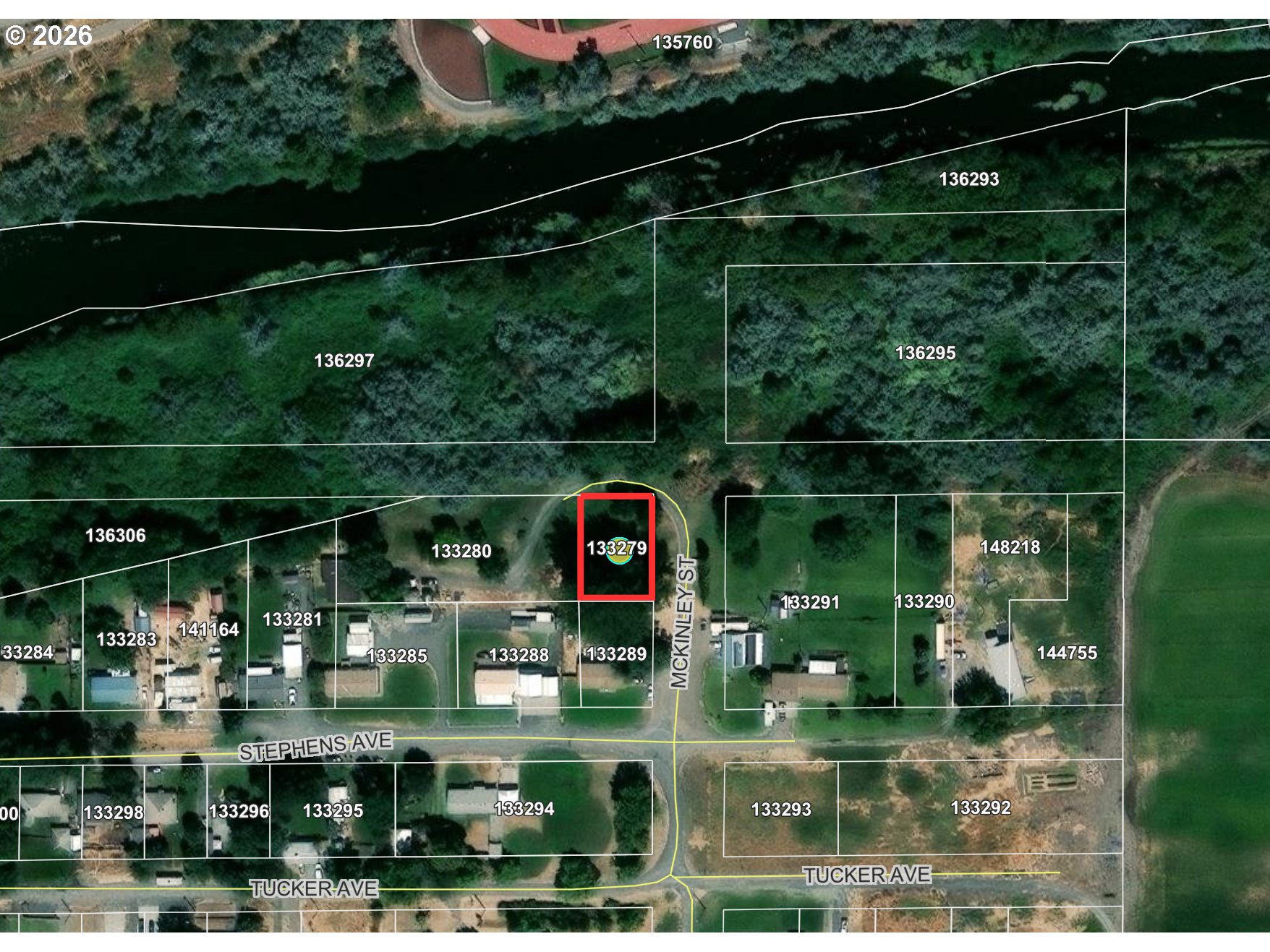 456 Vogel Street Umatilla, OR 97882 - Photo 6 of 6 a balcony with lots of green space and trees in the background