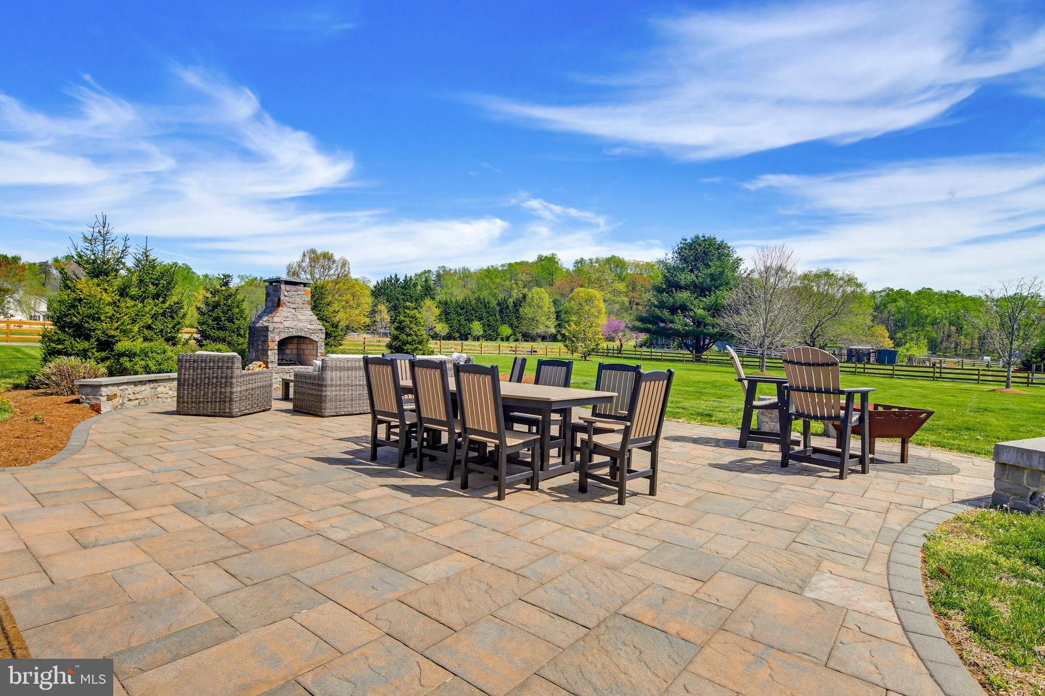 3229 Beards Point Road Davidsonville, MD 21035 - Photo 34 of 69 a view of a chairs and table in the patio