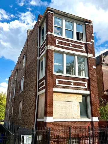 a front view of a multi story residential apartment building