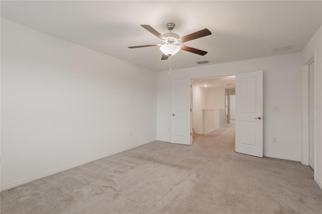 14302 Editors Note Street Ruskin, FL 33573 - Photo 13 of 44 a view of an empty room