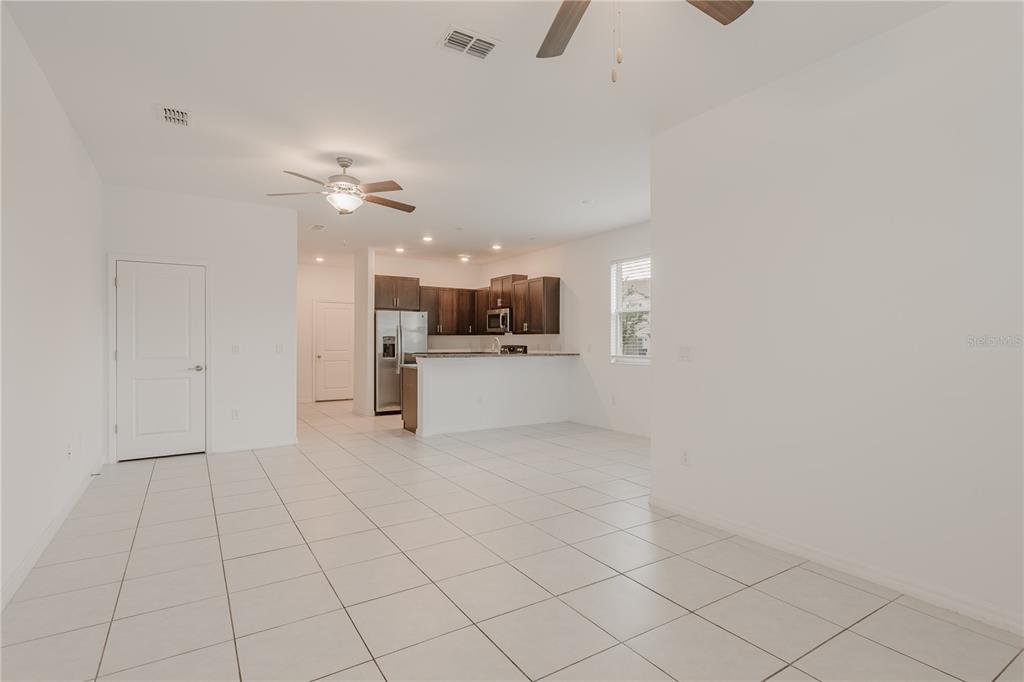14302 Editors Note Street Ruskin, FL 33573 - Photo 22 of 44 a view of a kitchen with a sink and dishwasher cabinets