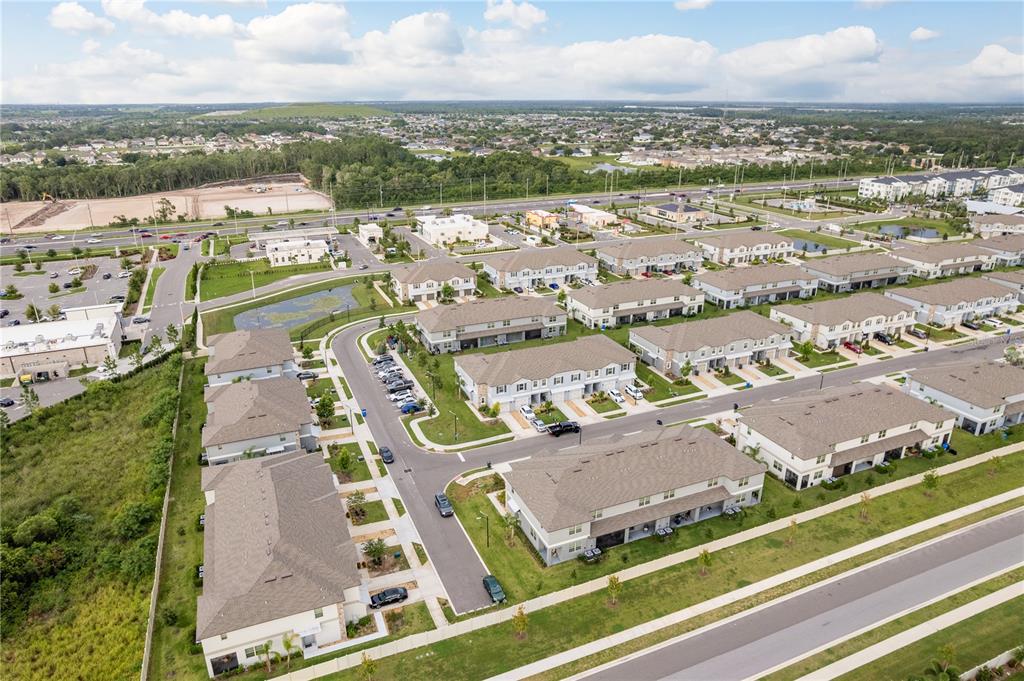 14302 Editors Note Street Ruskin, FL 33573 - Photo 41 of 44 an aerial view of residential houses with outdoor space
