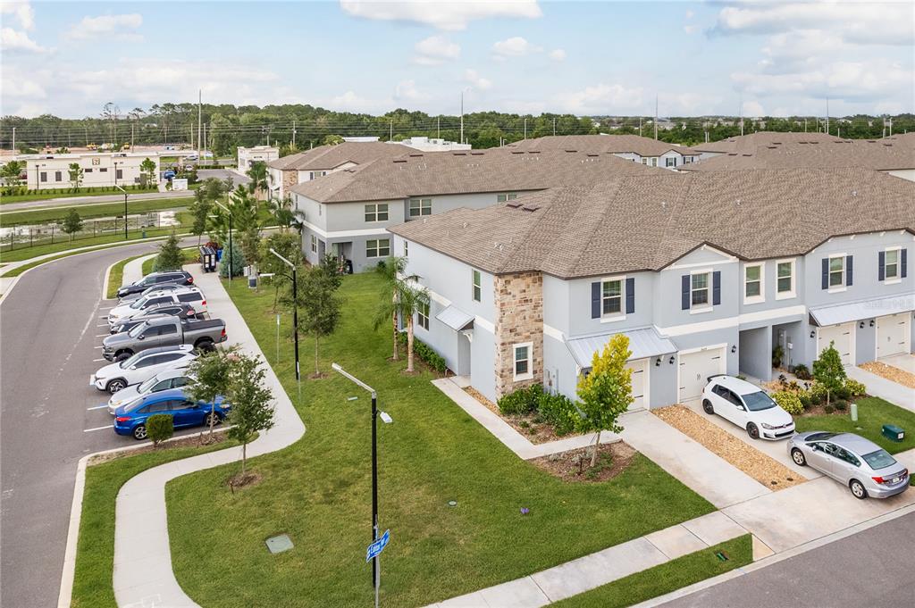 14302 Editors Note Street Ruskin, FL 33573 - Photo 42 of 44 aerial view of a house with outdoor space and lake view