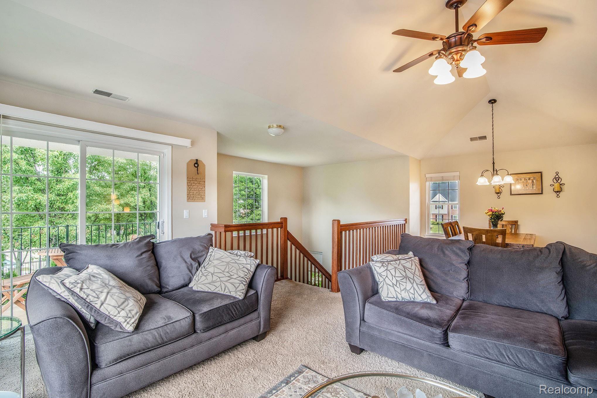 1123 Rial Lake Drive Howell, MI 48843 - Photo 4 of 19 View of balcony door wall and open stair way