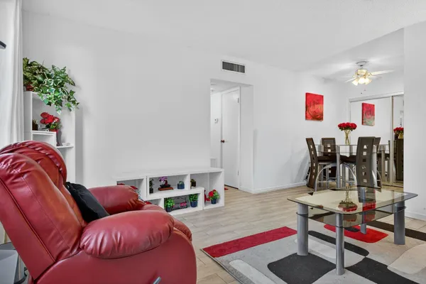 a living room with furniture and rug