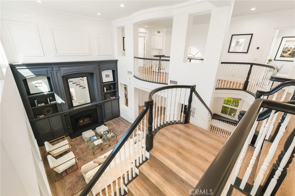 20112 Vía Cellini Porter Ranch, CA 91326 - Photo 24 of 64 a view of an entryway with wooden floor