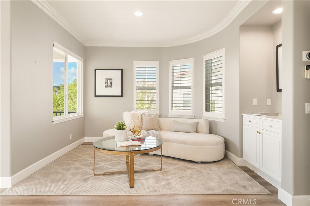 20112 Vía Cellini Porter Ranch, CA 91326 - Photo 29 of 64 a living room with furniture and a window