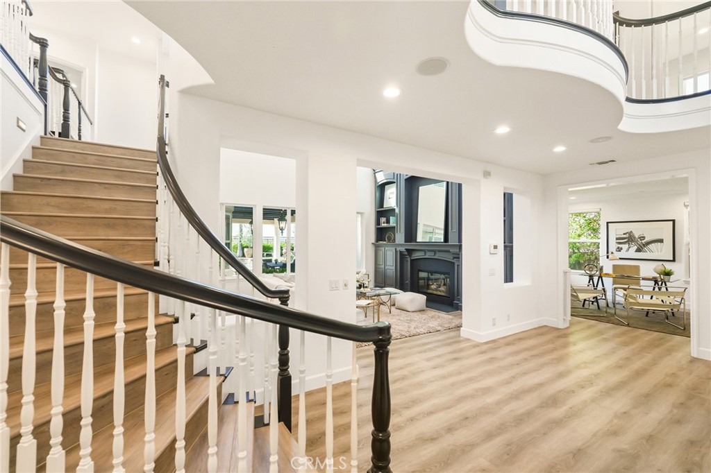 20112 Vía Cellini Porter Ranch, CA 91326 - Photo 3 of 64 a view of an entryway with wooden floor
