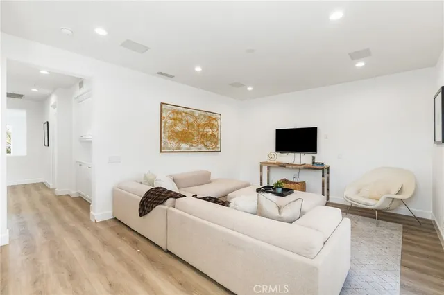 a bedroom with a bed and a table