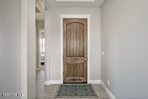 a bedroom with bed and a window