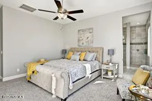 a kitchen with stainless steel appliances granite countertop a sink refrigerator and cabinets