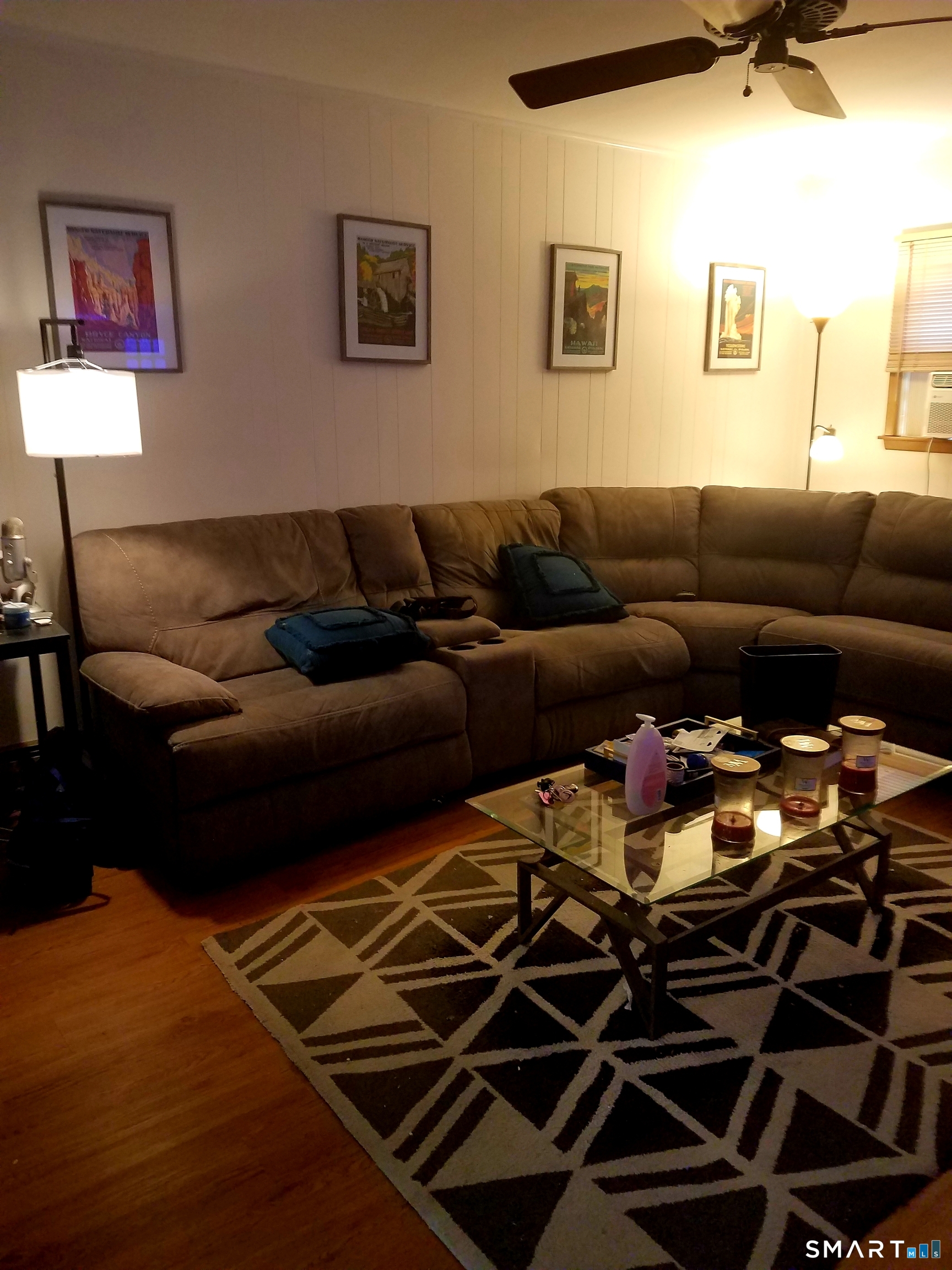 72 Maple Tree Avenue, Unit 2 Stamford, CT 06906 - Photo 4 of 25 a living room with furniture and a rug