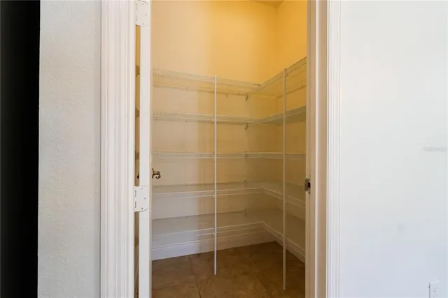 a kitchen with stainless steel appliances granite countertop a sink a stove and a microwave