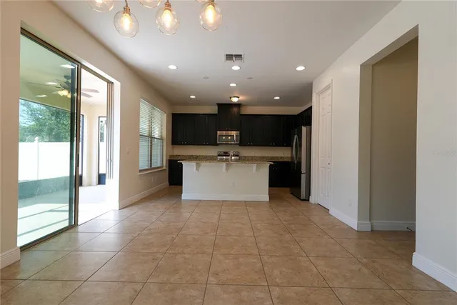 a view of balcony with ceiling fan