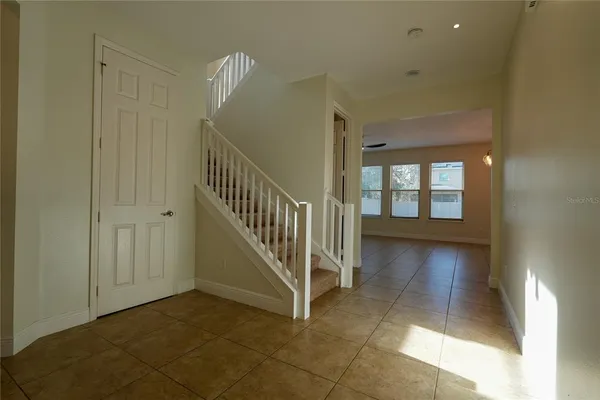 a view of a hallway with windows