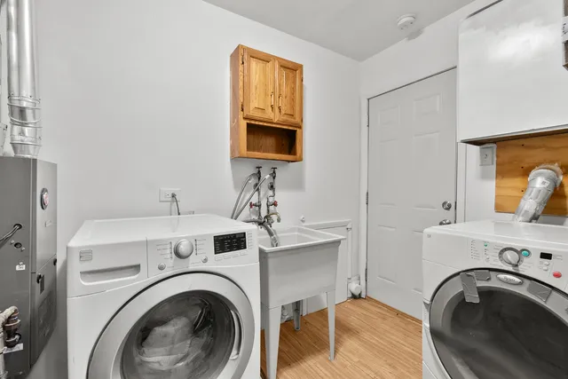 a view of livingroom with washer and dryer