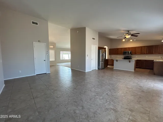 a view of a livingroom with furniture and chandelier