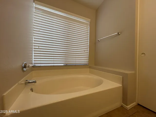 a view of a bathtub in a bathroom