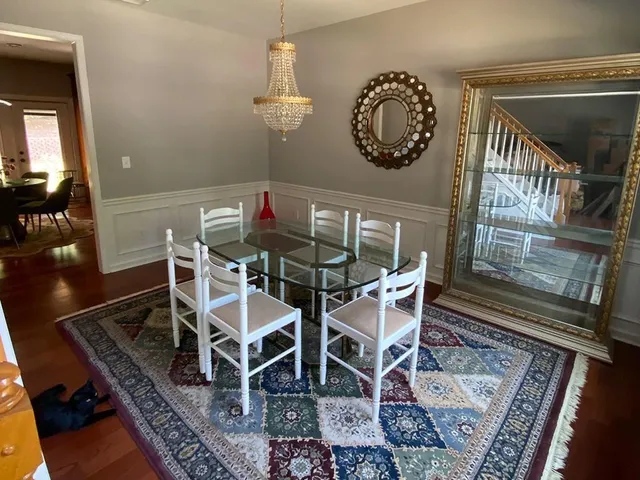 a view of a dining room with furniture
