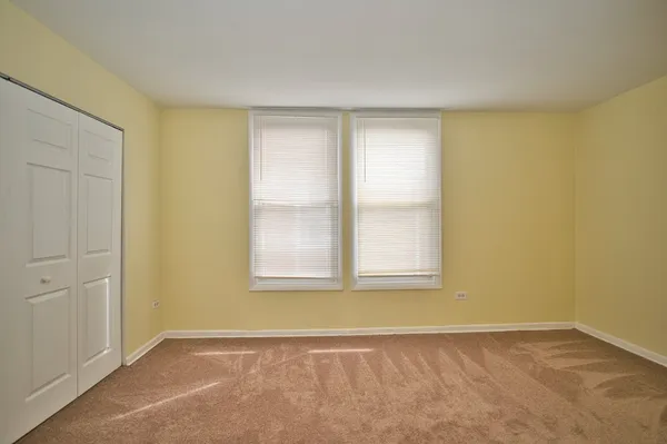 an empty room with a natural light