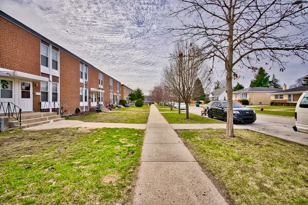 a view of street with houses
