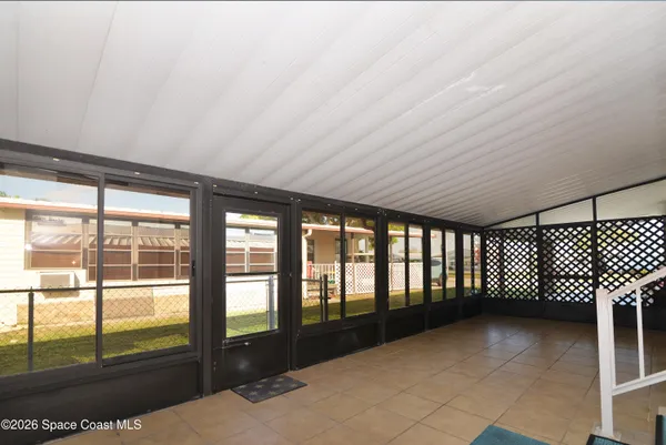 a view of backyard with tub