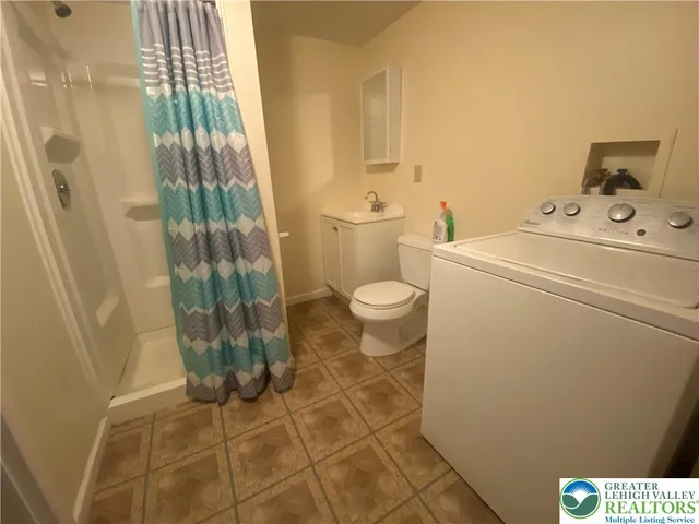a bathroom with a sink and a toilet