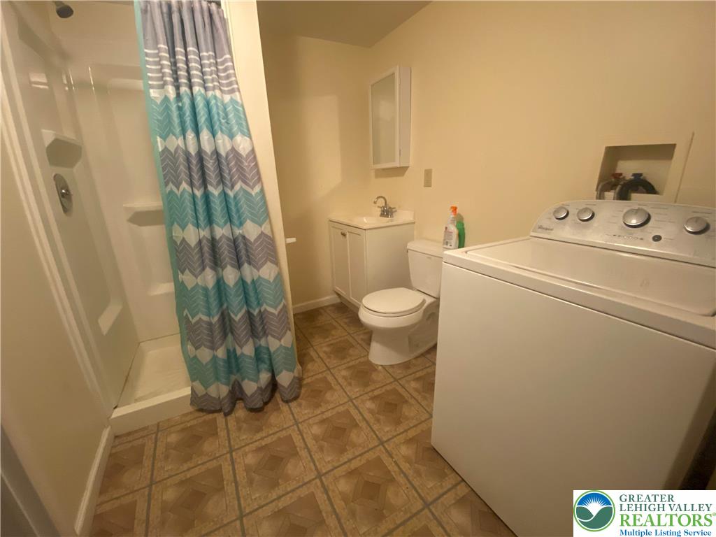 926 Butler Street Easton, PA 18042 - Photo 6 of 6 a bathroom with a sink and a toilet