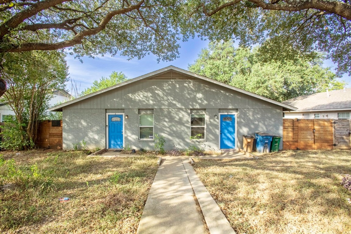 2003 Conestoga Trail, Unit B Austin, TX 78744 - Photo 1 of 18 a backyard of a house
