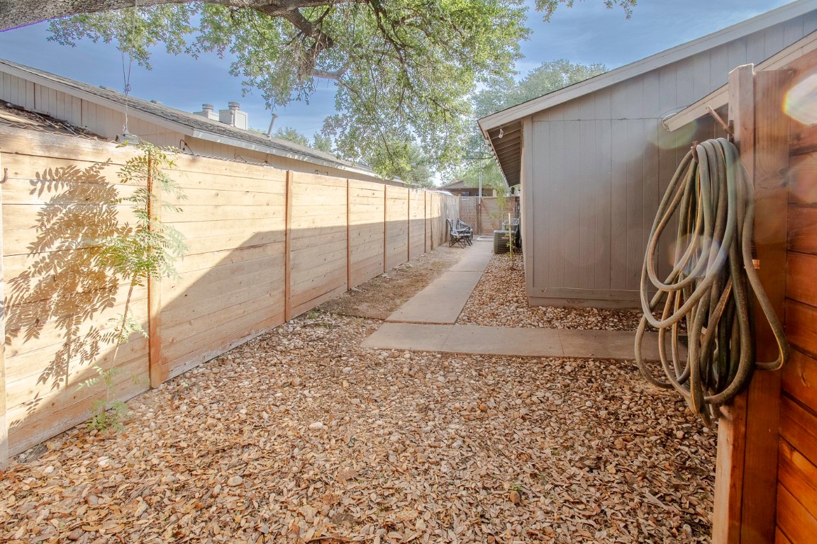 2003 Conestoga Trail, Unit B Austin, TX 78744 - Photo 15 of 18 a view of a backyard