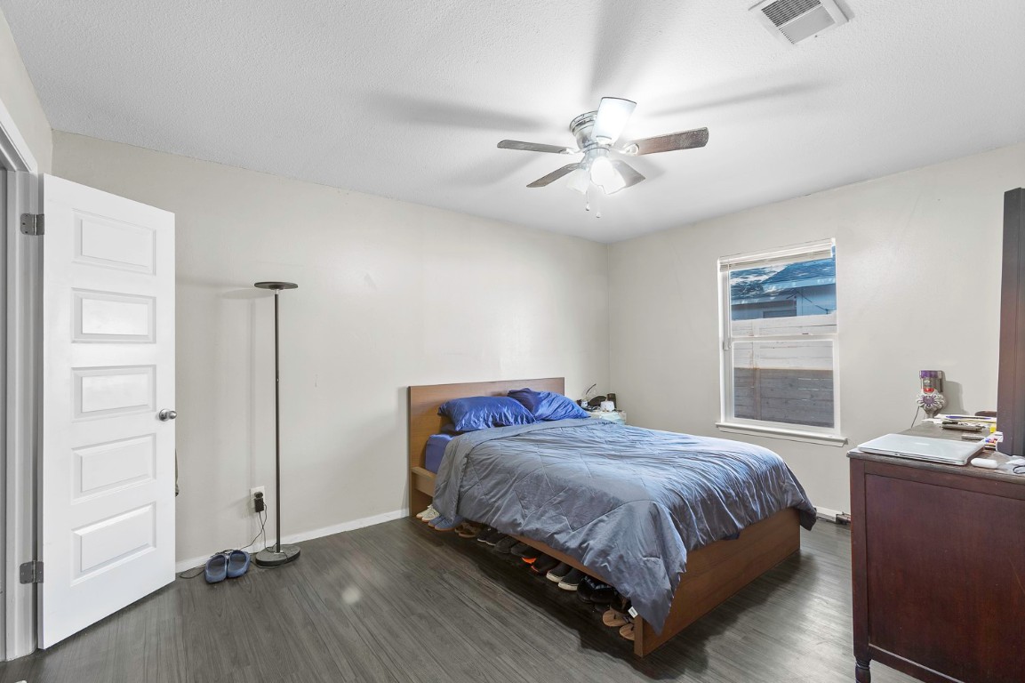 2003 Conestoga Trail, Unit B Austin, TX 78744 - Photo 9 of 18 a bedroom with a bed and closet