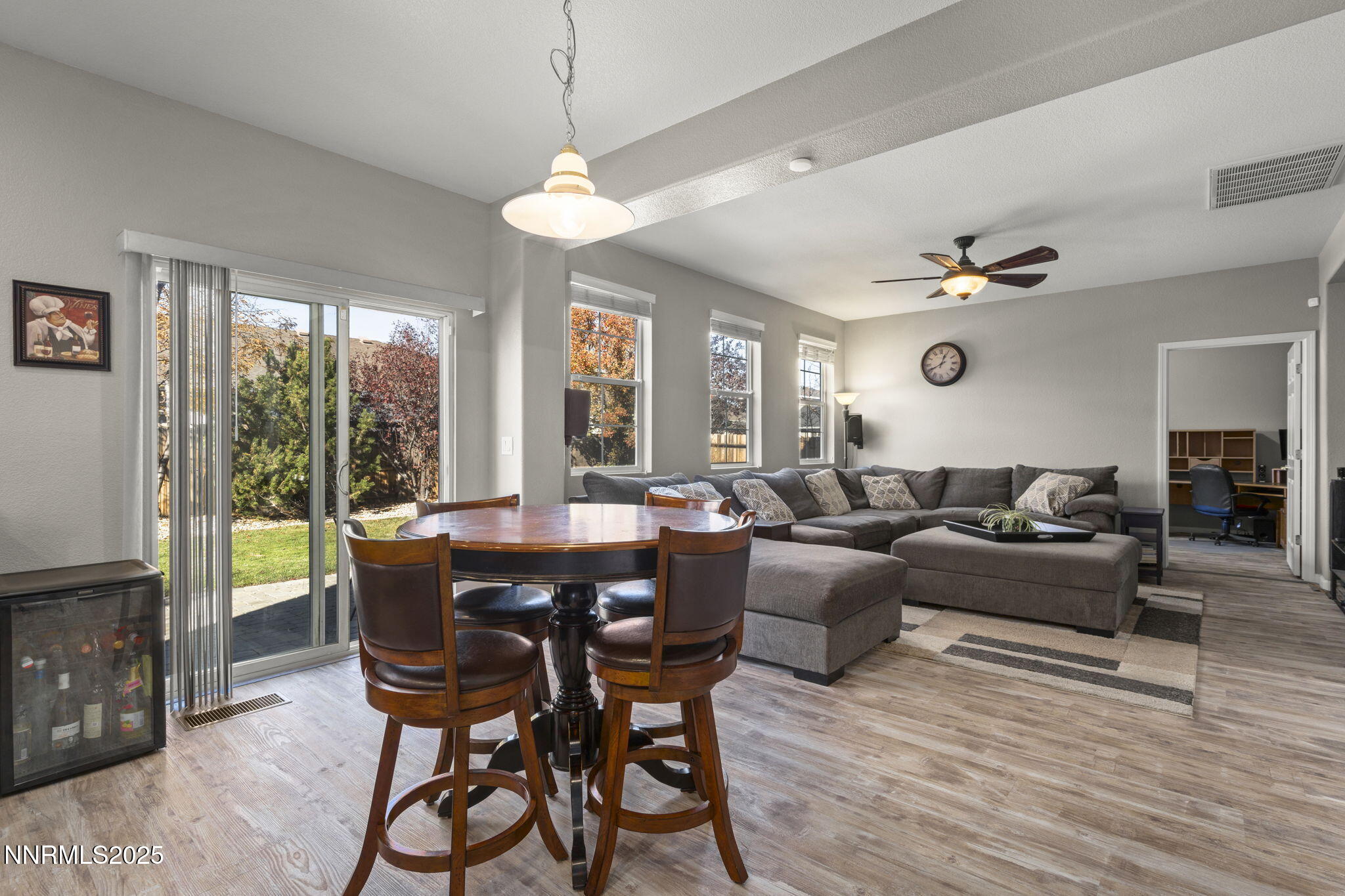 8963 Wynne Street Reno, NV 89506 - Photo 12 of 32 a view of a dining room with furniture window and outside view