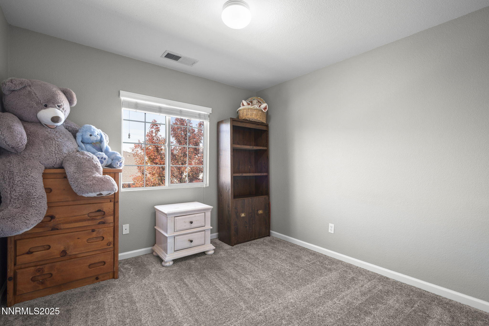 8963 Wynne Street Reno, NV 89506 - Photo 24 of 32 wooden floor and window in a room