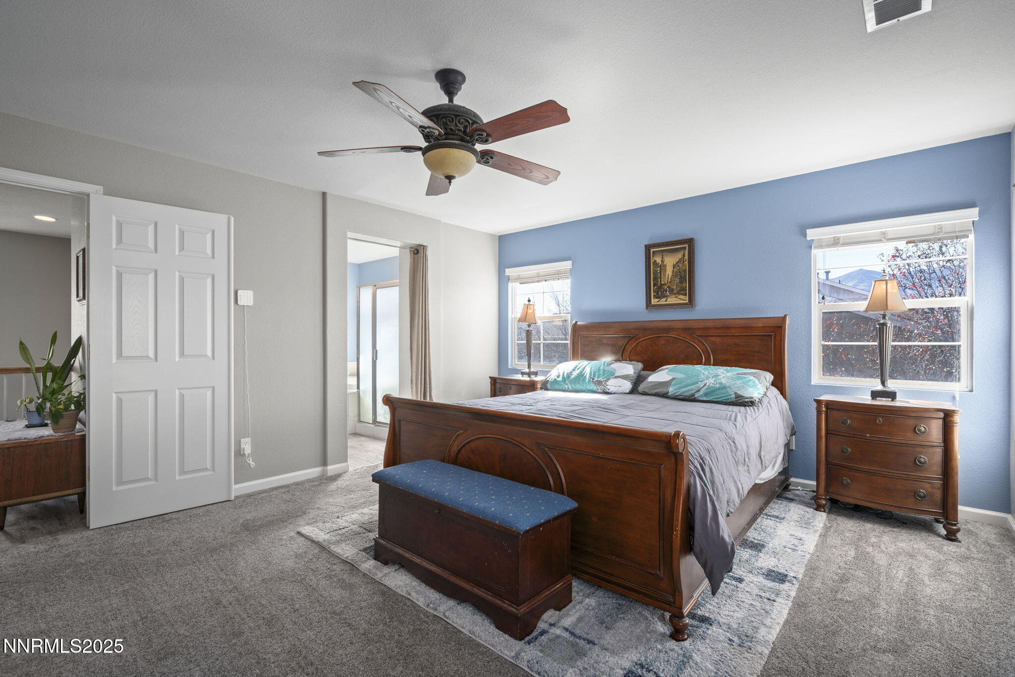 8963 Wynne Street Reno, NV 89506 - Photo 26 of 32 a bed room with a bed and a window