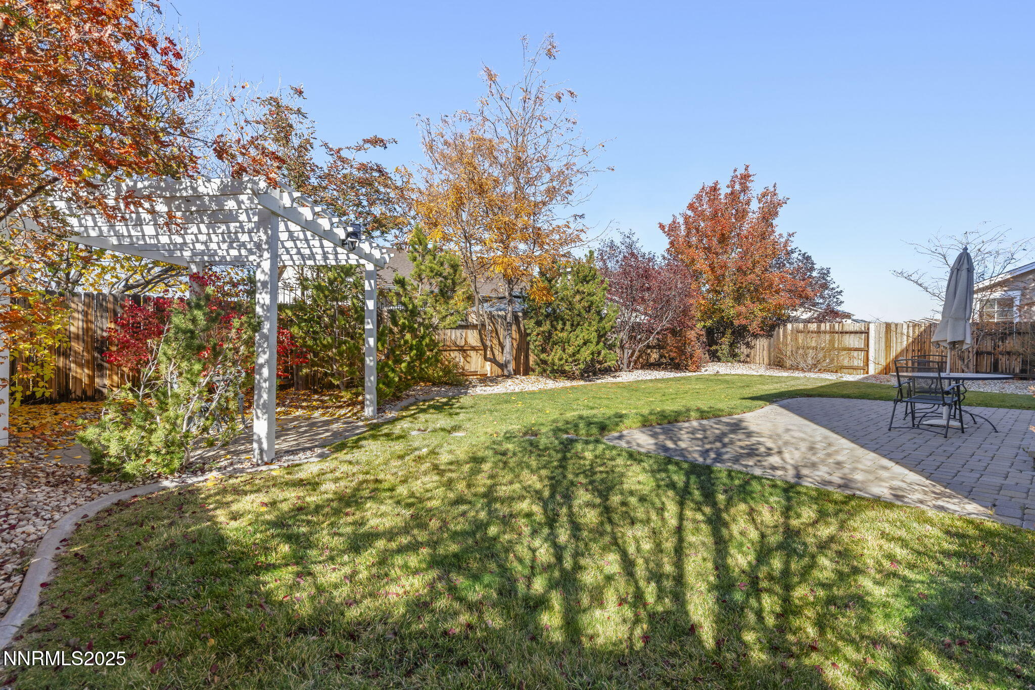 8963 Wynne Street Reno, NV 89506 - Photo 29 of 32 a view of yard with tree