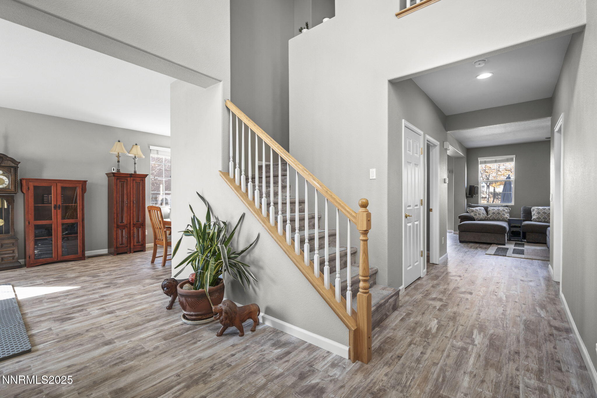 8963 Wynne Street Reno, NV 89506 - Photo 4 of 32 a view of entryway and hall with wooden floor