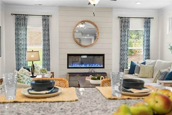 a living room with a couch and a fireplace