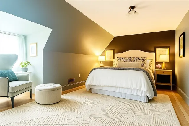 a bedroom with a bed and a couch