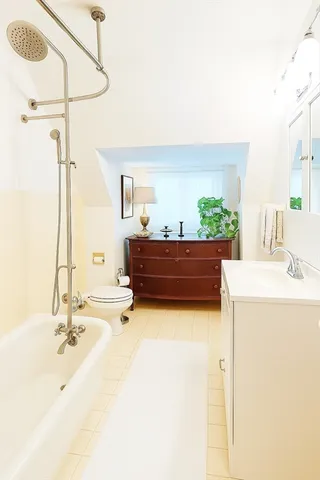 a bathroom with a sink double vanity and a mirror