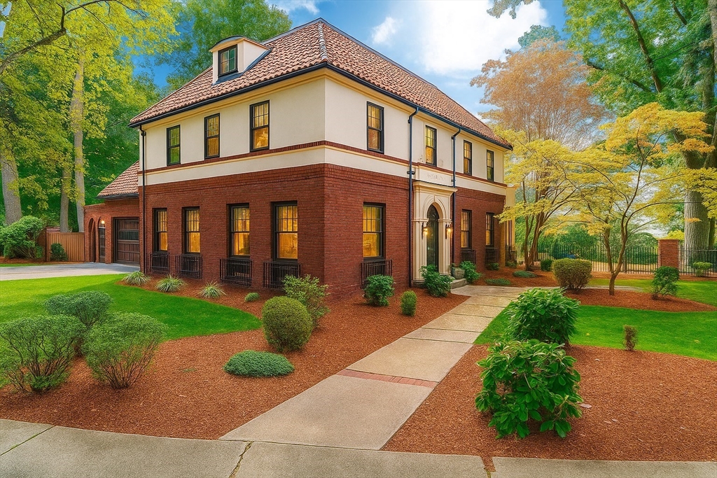 177 Springfield Street Springfield, MA 01107 - Photo 2 of 19 a front view of a house with garden