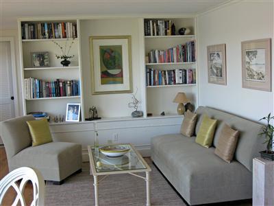 111 Goose Point Road Centerville, MA 02601 - Photo 12 of 21 a living room with furniture and a book shelf