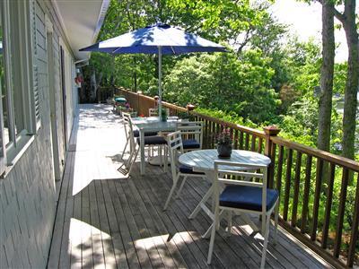 111 Goose Point Road Centerville, MA 02601 - Photo 17 of 21 a view of balcony with outdoor seating and wooden floor