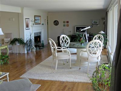 111 Goose Point Road Centerville, MA 02601 - Photo 8 of 21 a view of a livingroom with furniture and a floor to ceiling window