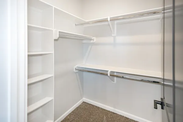 a view of an empty walk in closet