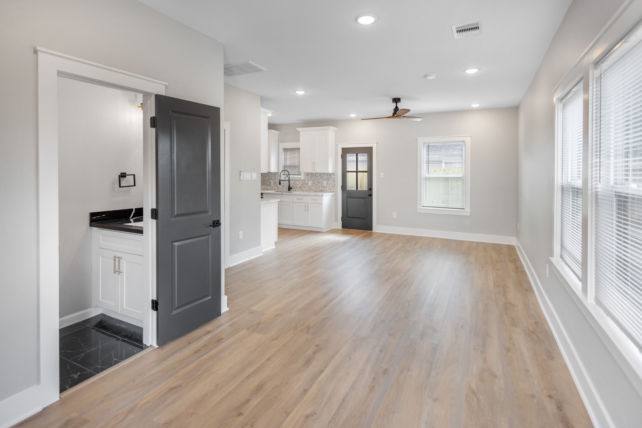 5036 Mallow Street, Unit A Houston, TX 77033 - Photo 9 of 36 a view of kitchen with sink and refrigerator