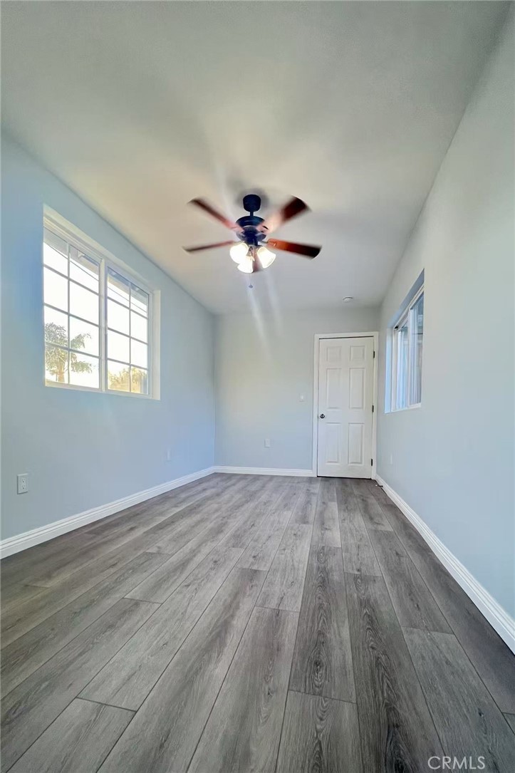 172 1/2 North Winton Avenue La Puente, CA 91744 - Photo 2 of 6 wooden floor in an empty room with a window