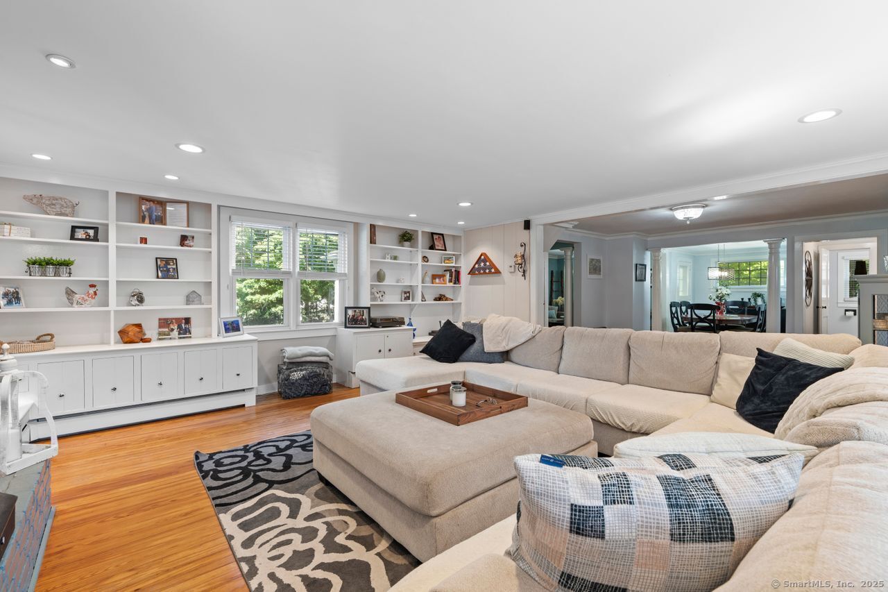 74 Middle Quarter Road Woodbury, CT 06798 - Photo 22 of 38 a living room with furniture and a large window